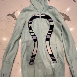 Light blue Lululemon workout jacket with multicolor lulu logo!